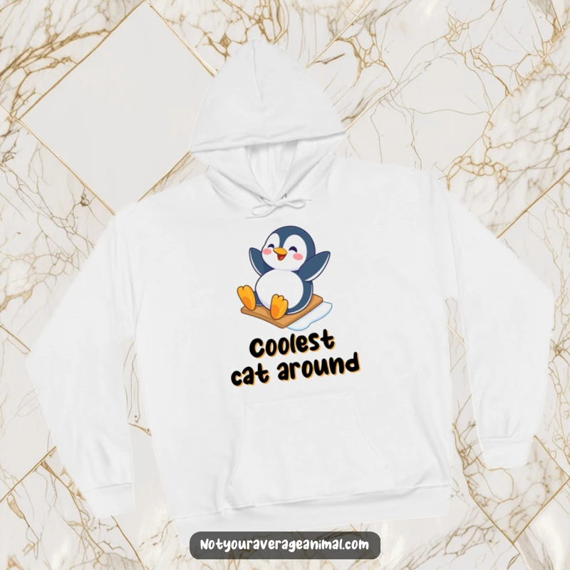 Funny hoodie depicting a happy penguin character joyfully sliding down an icy slope, perfect for cozy winter wear and penguin fans.