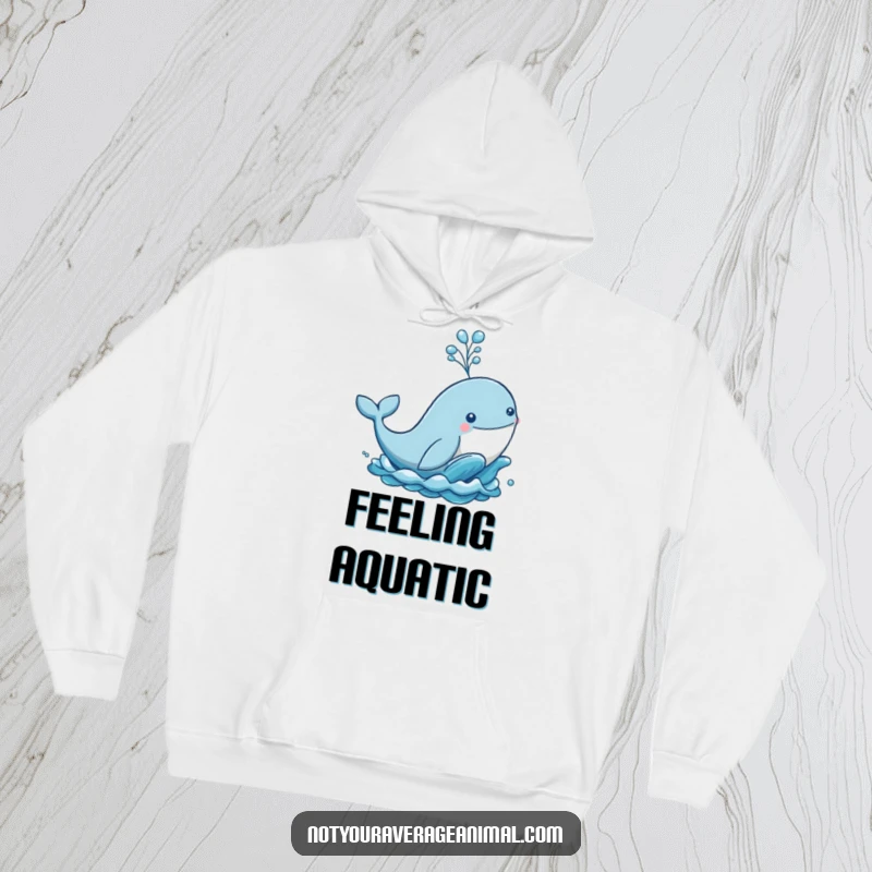 Funny hoodie featuring a majestic whale breaching the ocean waves, releasing a playful and impressive spout of water.