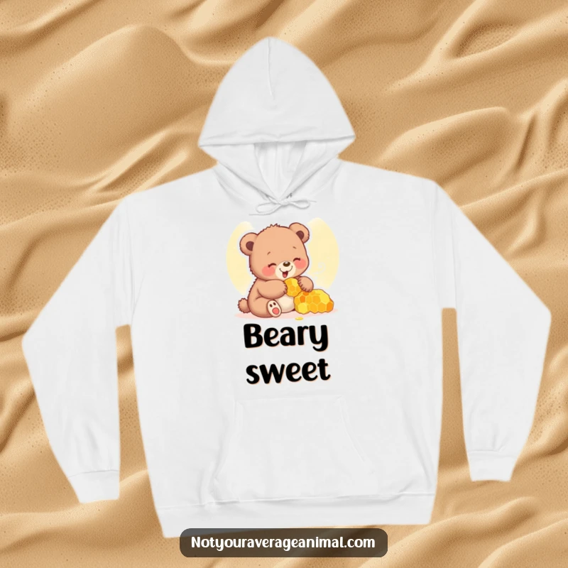 Funny bear cub hoodie featuring a happy cub giggling with a honeycomb, perfect for cozying up.