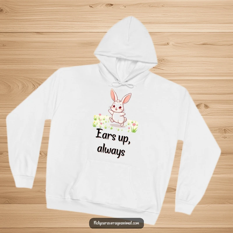 Funny hoodie design of a cheerful rabbit with long ears, hopping with great enthusiasm through a sun-kissed field.