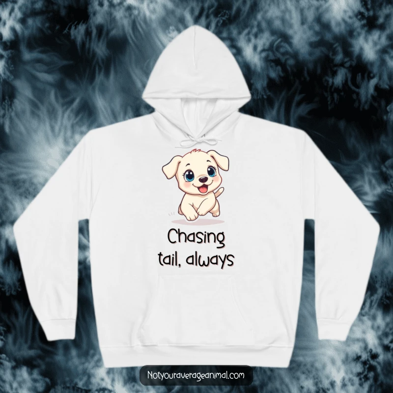 Funny puppy hoodie featuring a small dog with wide, excited eyes, comically chasing its tail, embodying pure puppy joy.