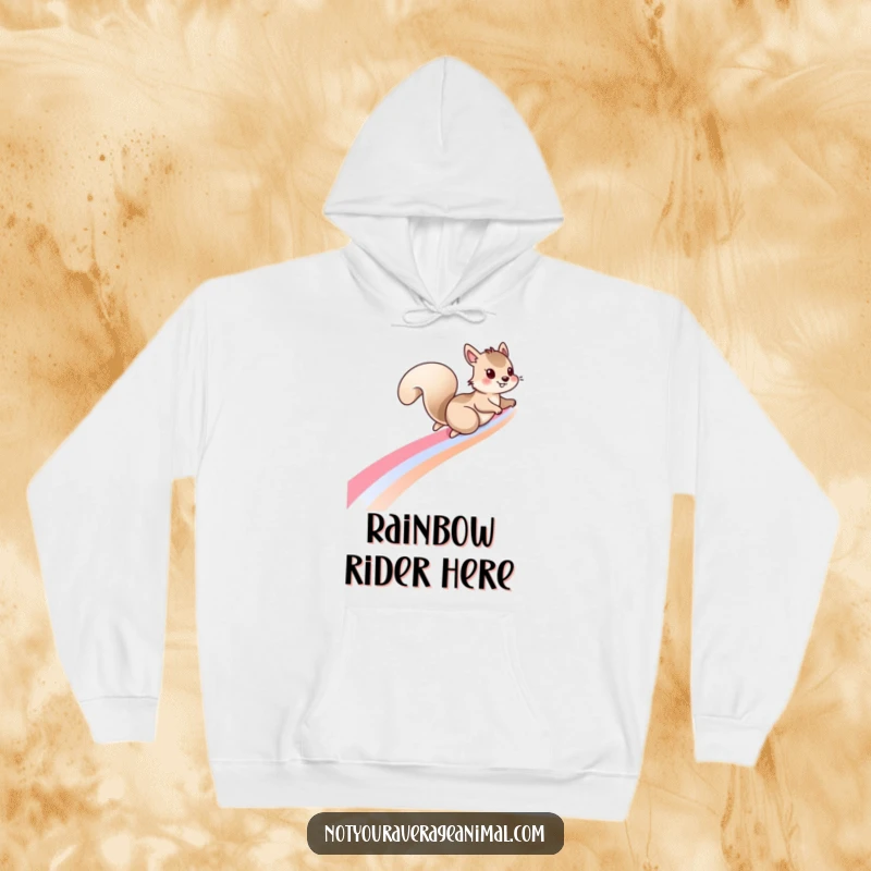 Funny squirrel hoodie with a mischievous squirrel sliding down a vibrant rainbow, offering cozy warmth and a touch of playful fantasy.
