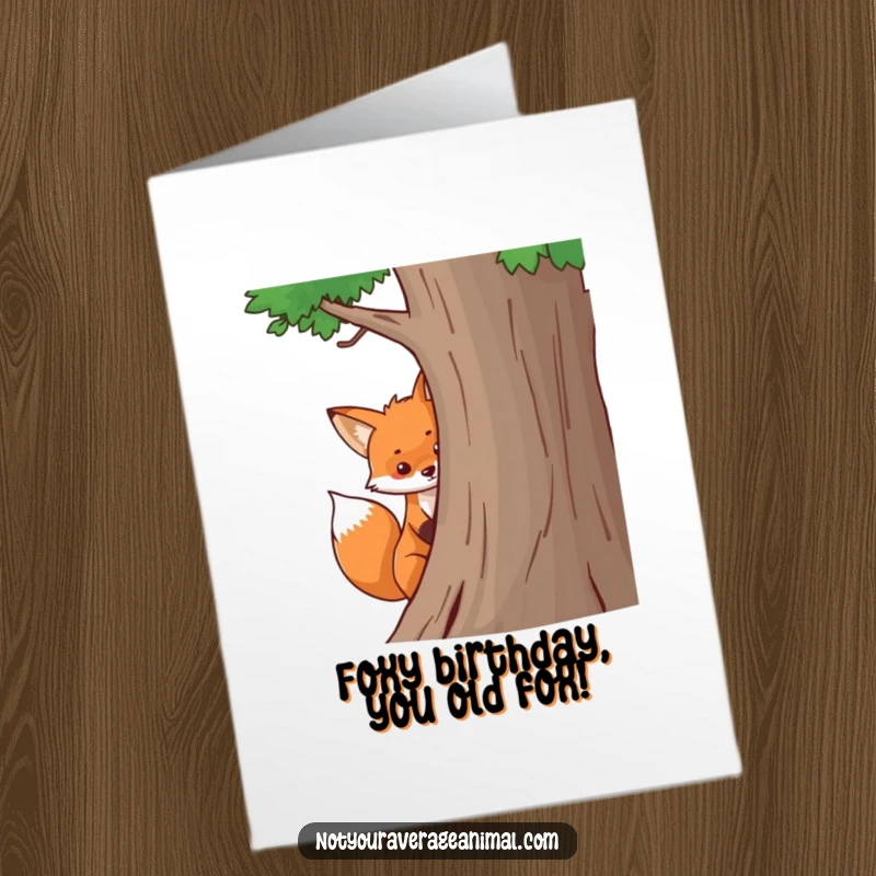 Funny Free Printable Birthday Card: A playful fox with a bushy tail peeks mischievously from behind a tree, ready to wish a happy birthday.