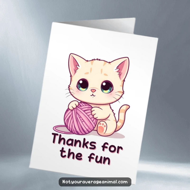 Funny Free Printable Thank You Card: A cute cat with mesmerized eyes tangles with a ball of yarn, sending thanks.