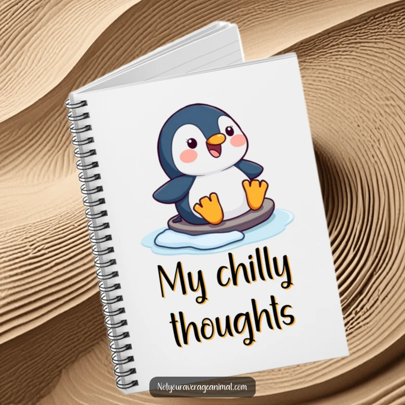 Funny happy penguin notebook with a character joyfully sliding on ice, great for jotting notes.