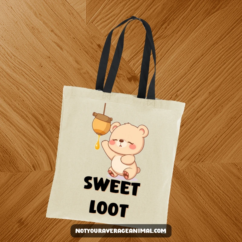 Funny tote bag depicting a sleepy bear cub with wide, excited eyes, reaching for a tantalizing, dangling honeypot, ready for treats.