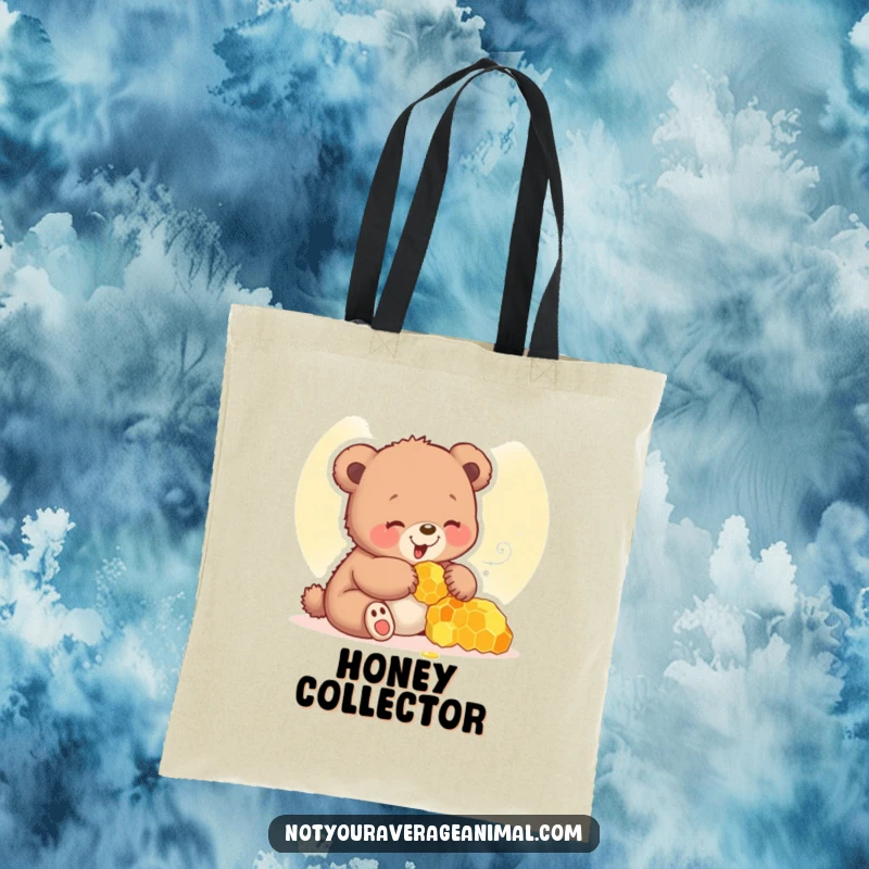 Funny bear cub tote bag showing a giggling cub playing with a honeycomb, perfect for carrying essentials.